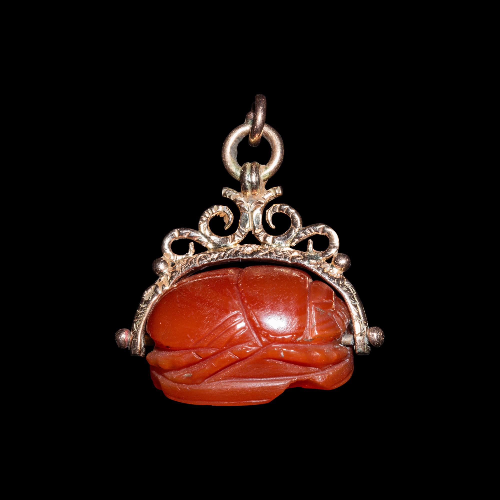 An Etruscan Carnelian Scarab with Warrior on Horseback and a Griffin — Set in a 19th Century gold swivel fob