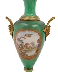 A Pair of Sèvres Style Gilt Metal Mounted Porcelain Urns