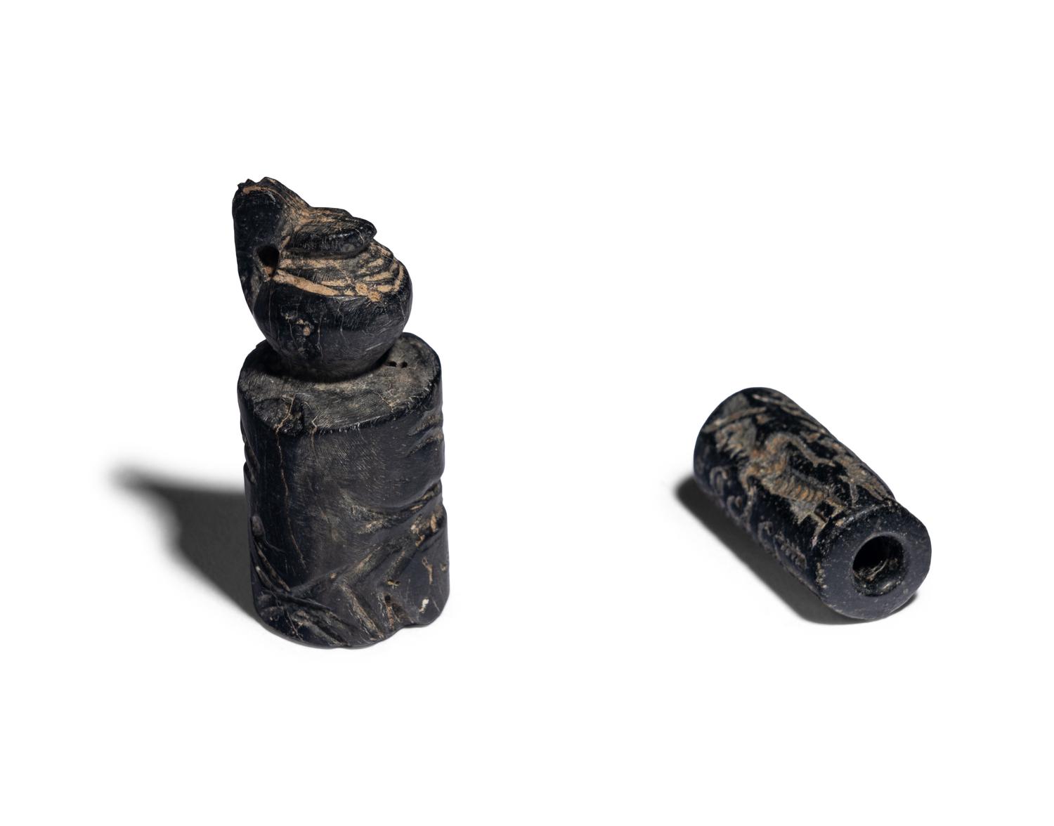 Two Near Eastern Hematite Cylinder Seals
