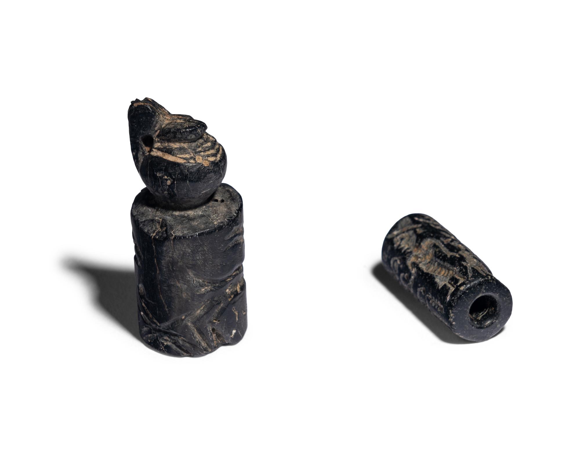 Two Near Eastern Hematite Cylinder Seals