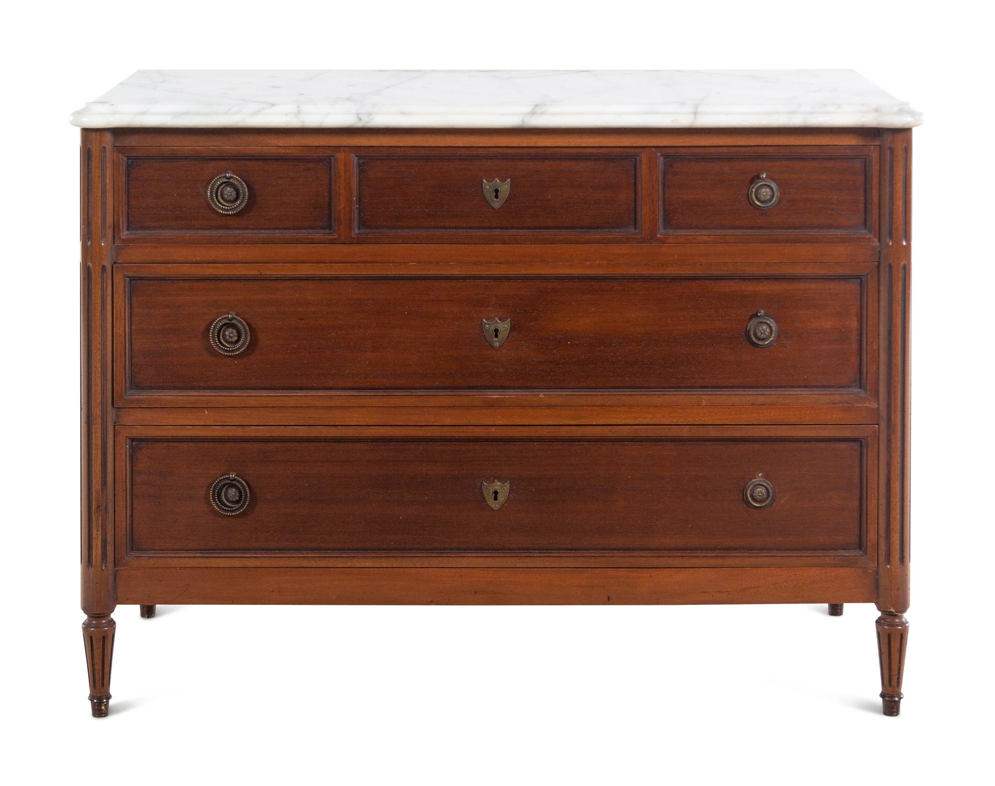 A Louis XVI Style Mahogany Marble-Top Commode