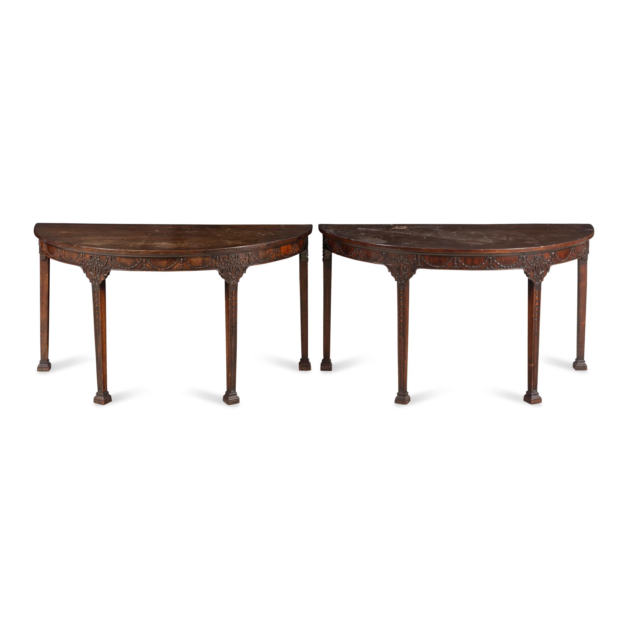 A Pair of George III Style Carved Mahogany Demilune Console Tables