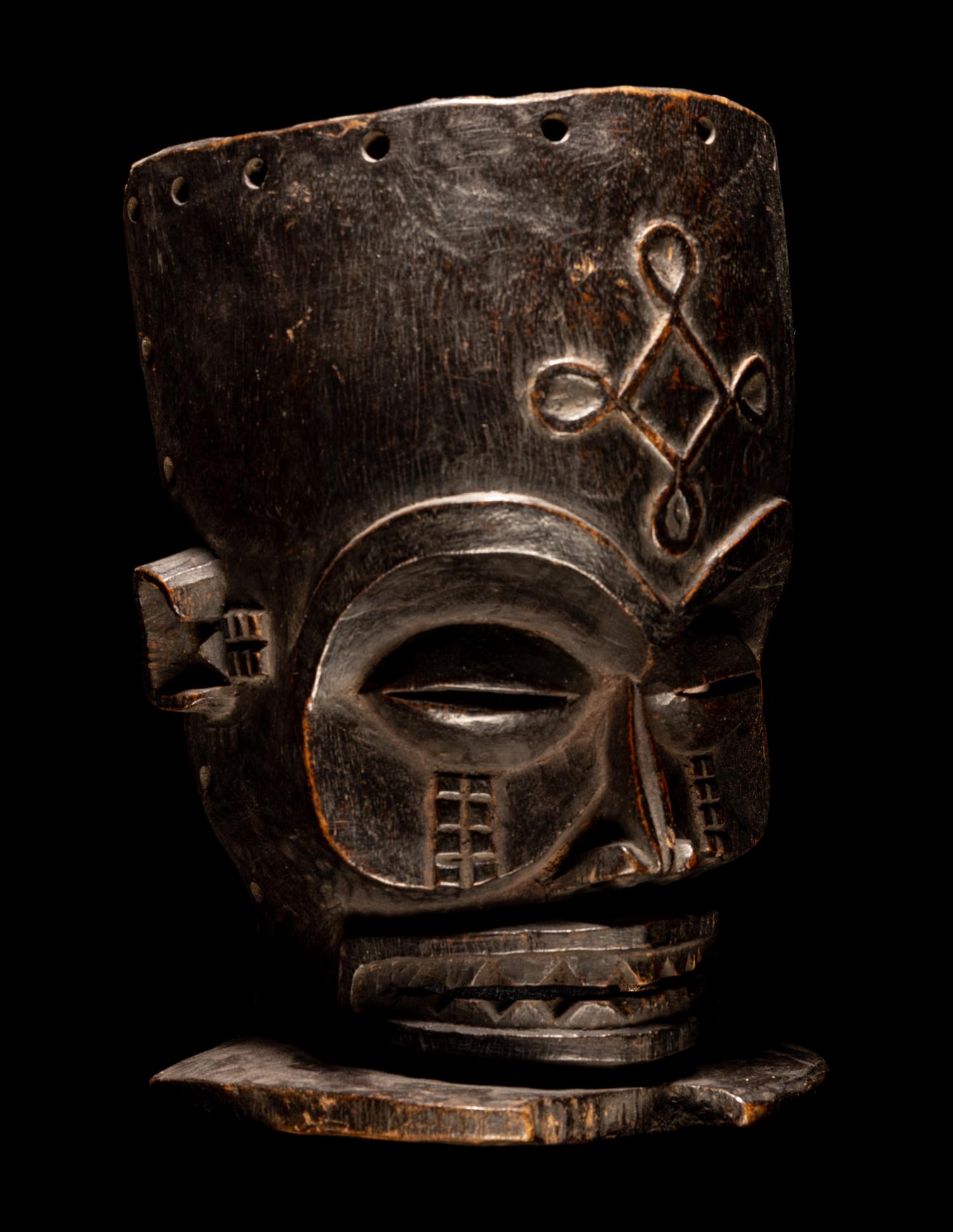 A Chokwe Wood Helmet Mask