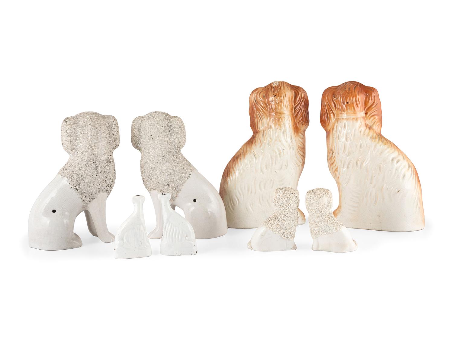 Eight Staffordshire Glazed Earthenware Hounds and Spaniels