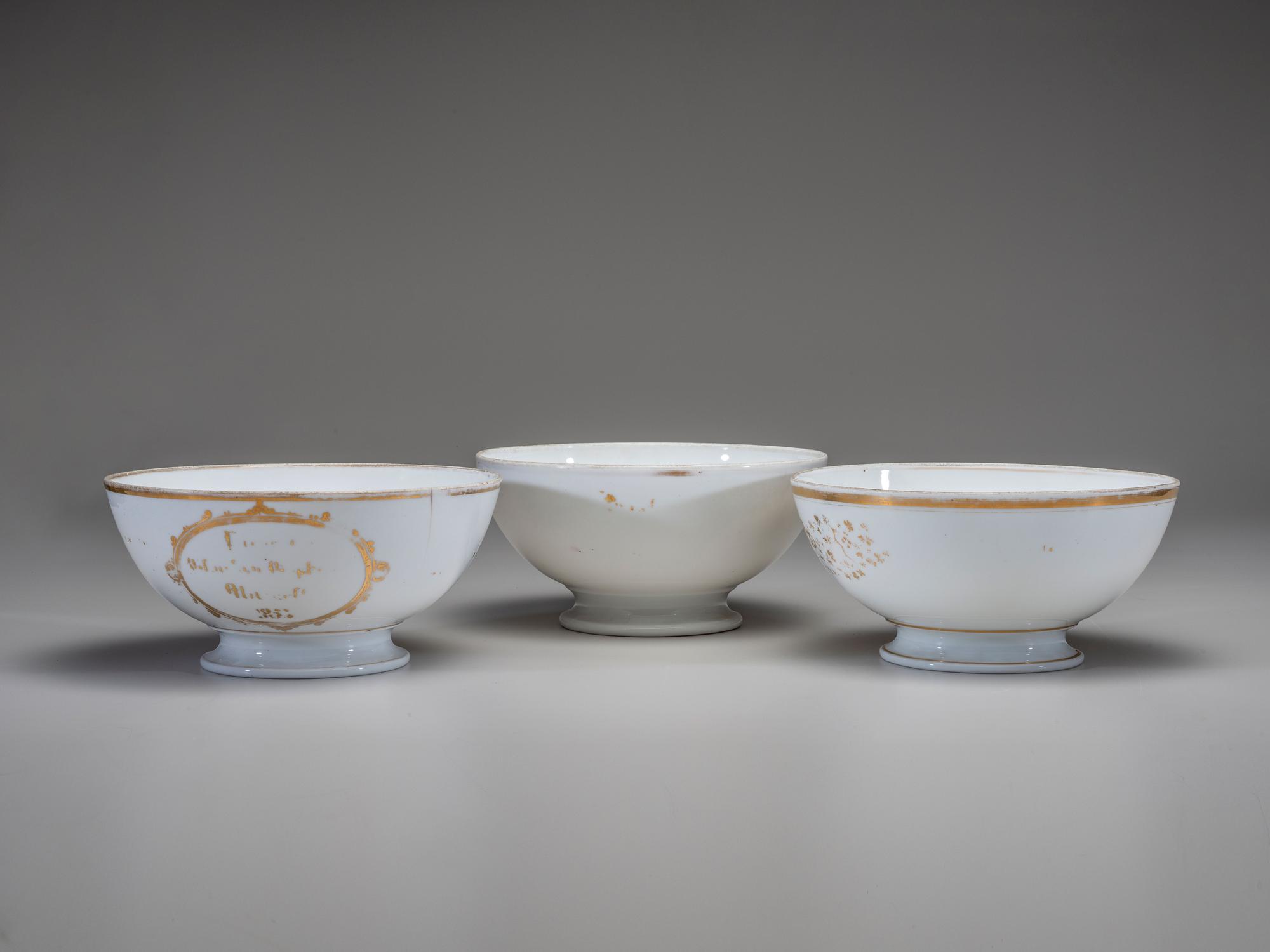 Three English Parcel Gilt and Hand-Painted Porcelain Bowls