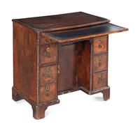 A George II Walnut Kneehole Desk