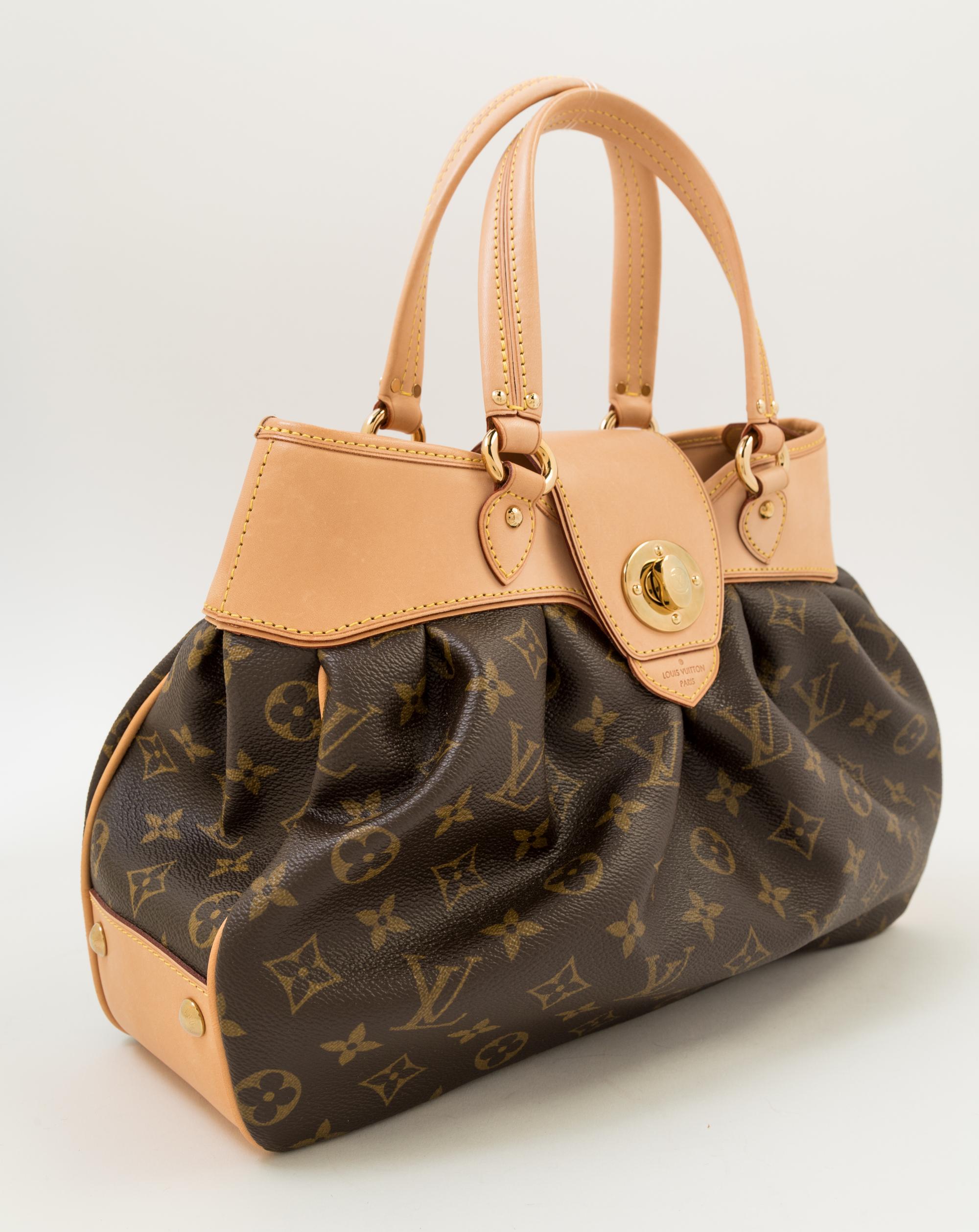 A Louis Vuitton Monogram Boetie PM, 13" x 9" x 4.5"; Handle drop: 6".