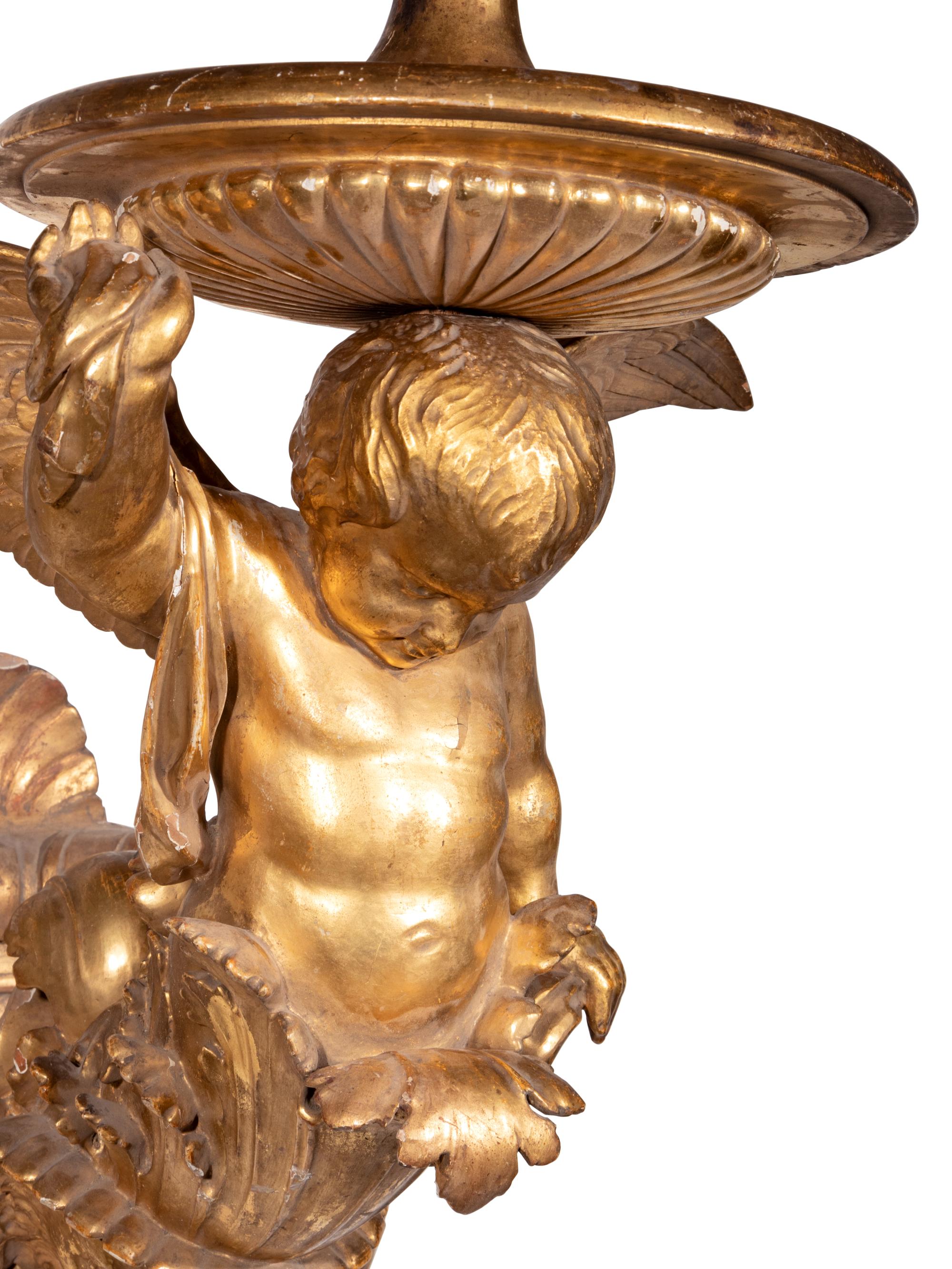 A Pair of Italian Giltwood Figural Wall Brackets