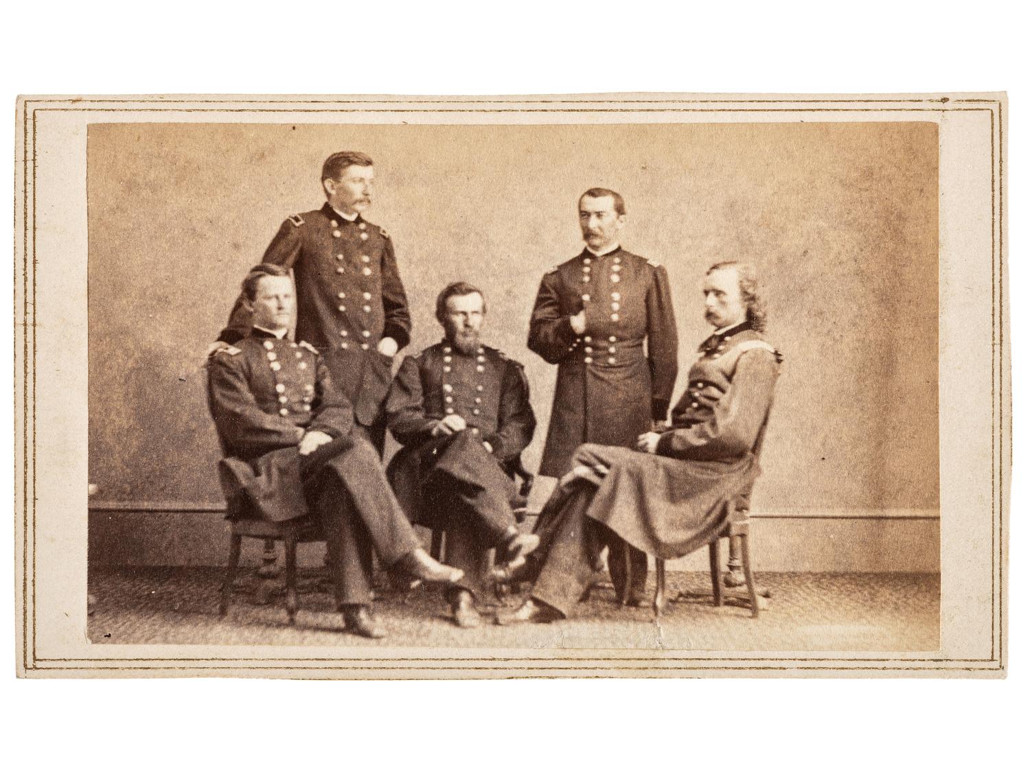 [CUSTER, George Armstrong (1839-1876)]. GARDNER, Alexander (1821-1882), artist. CDV of General Philip Sheridan and his staff including Generals Merritt, Forsyth, Crook, and Custer. Washington, DC: Philp & Solomons, [1865].