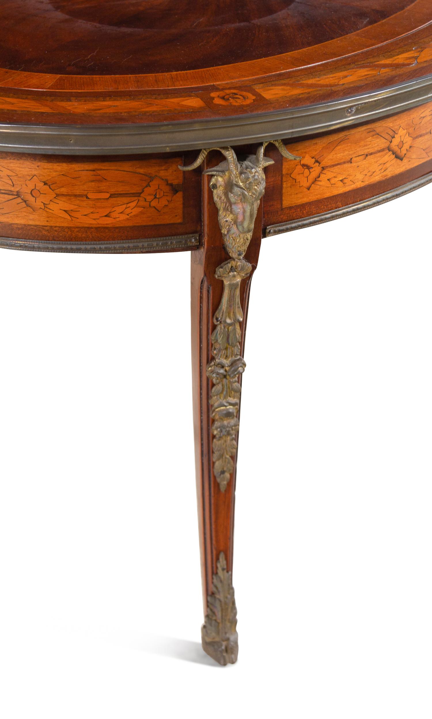 A Near Pair of Louis XV Style Gilt Bronze Mounted Marquetry Low Tables