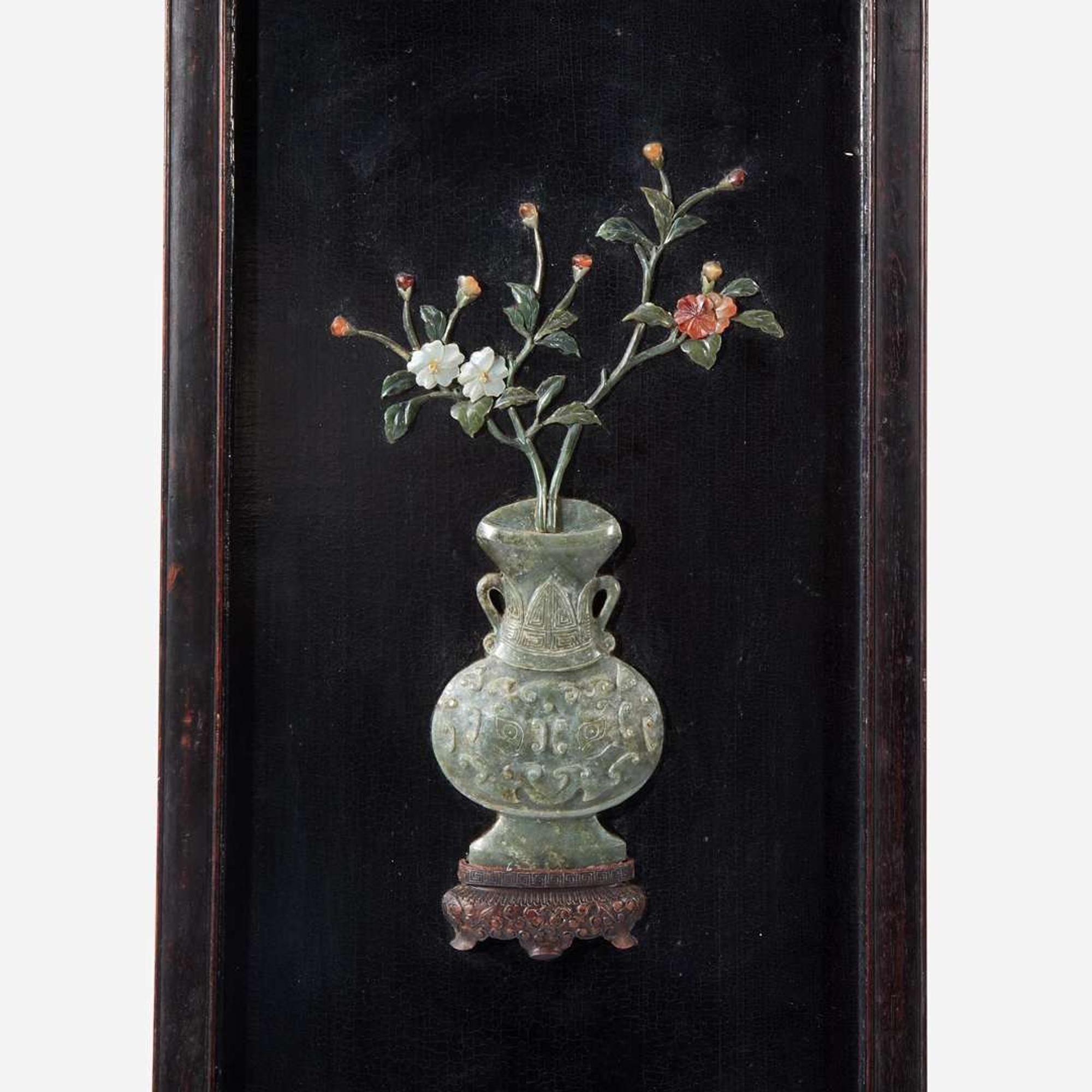 A pair of Chinese jade and hardstone embellished wood panels