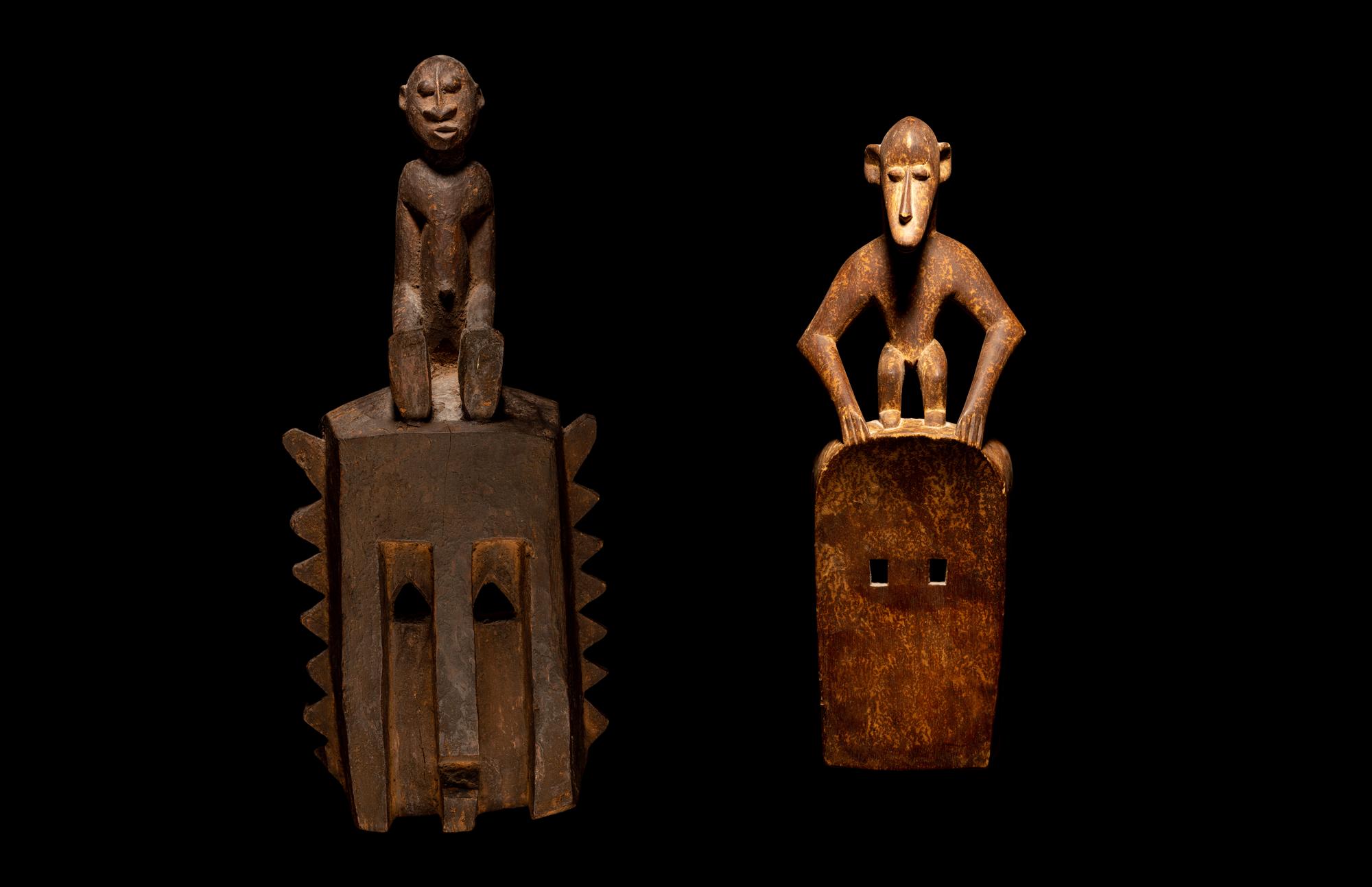 Two Dogon Wood Masks with Figures