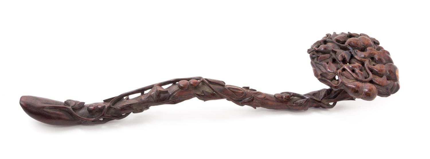 A Carved Hardwood Ruyi Scepter Length 15 1/2 inches.