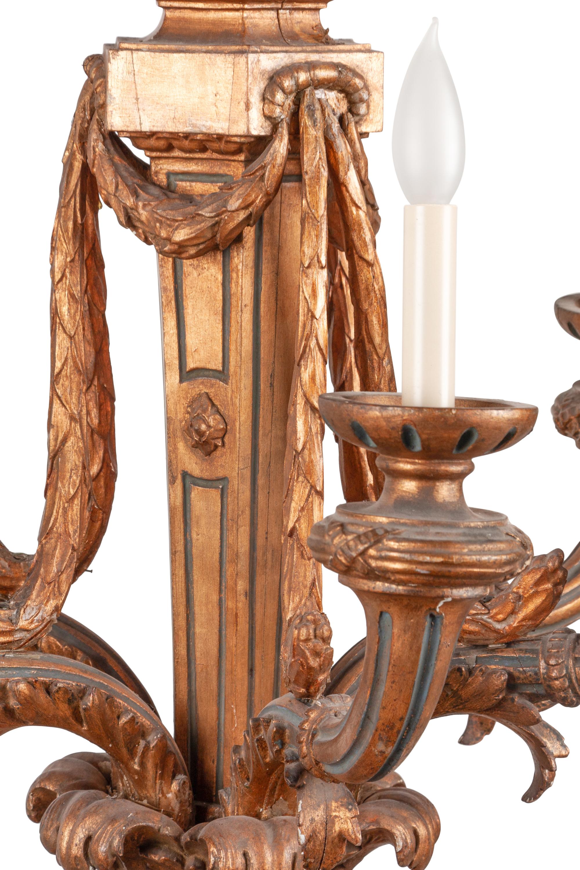 An Italian Baroque Style Giltwood Six-Light Chandelier