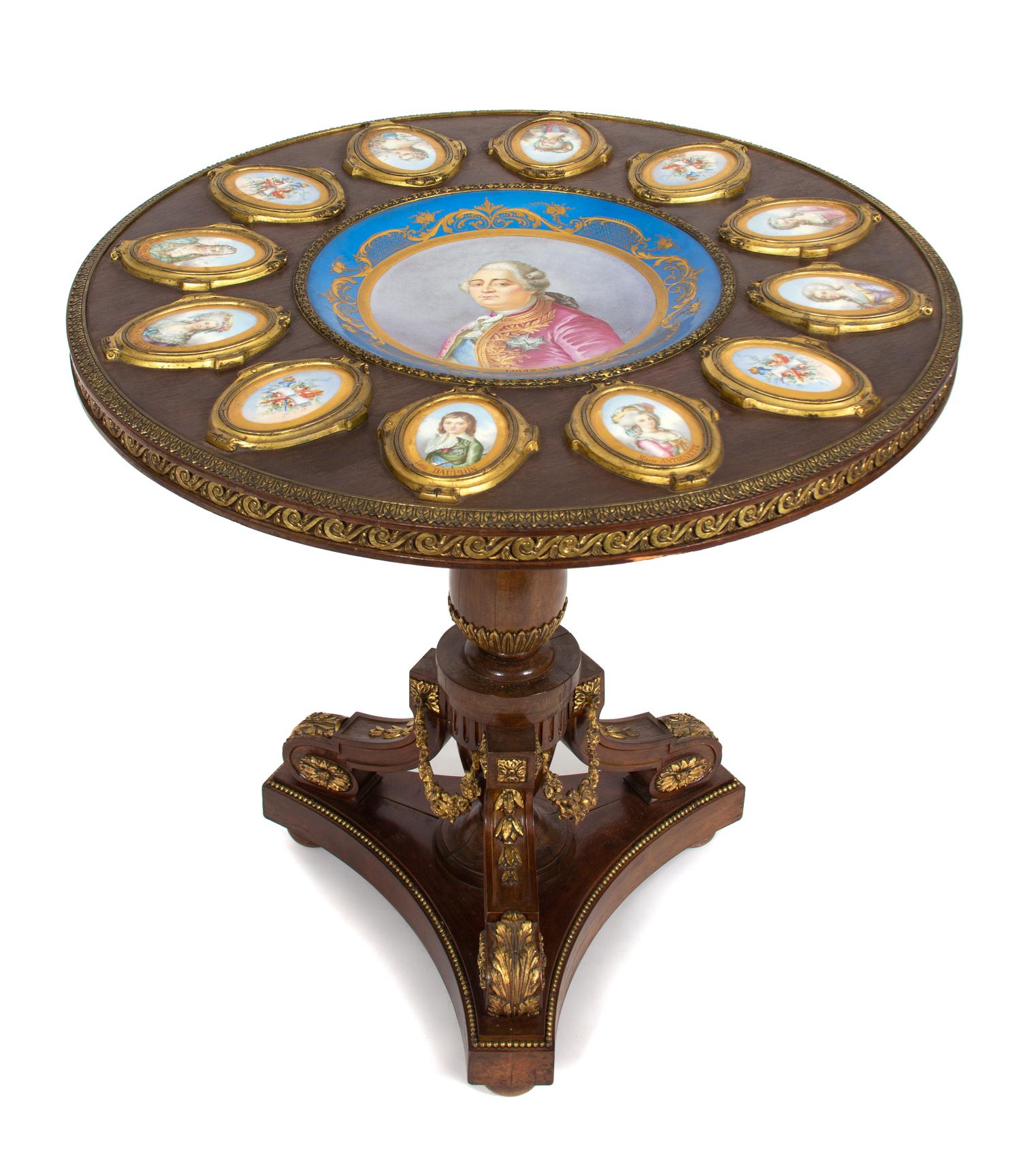 A Sevres Style Porcelain and Gilt Bronze Mounted Mahogany Gueridon Height 30 x diameter 29 inches. — 19TH CENTURY