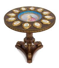 A Sevres Style Porcelain and Gilt Bronze Mounted Mahogany Gueridon Height 30 x diameter 29 inches. — 19TH CENTURY