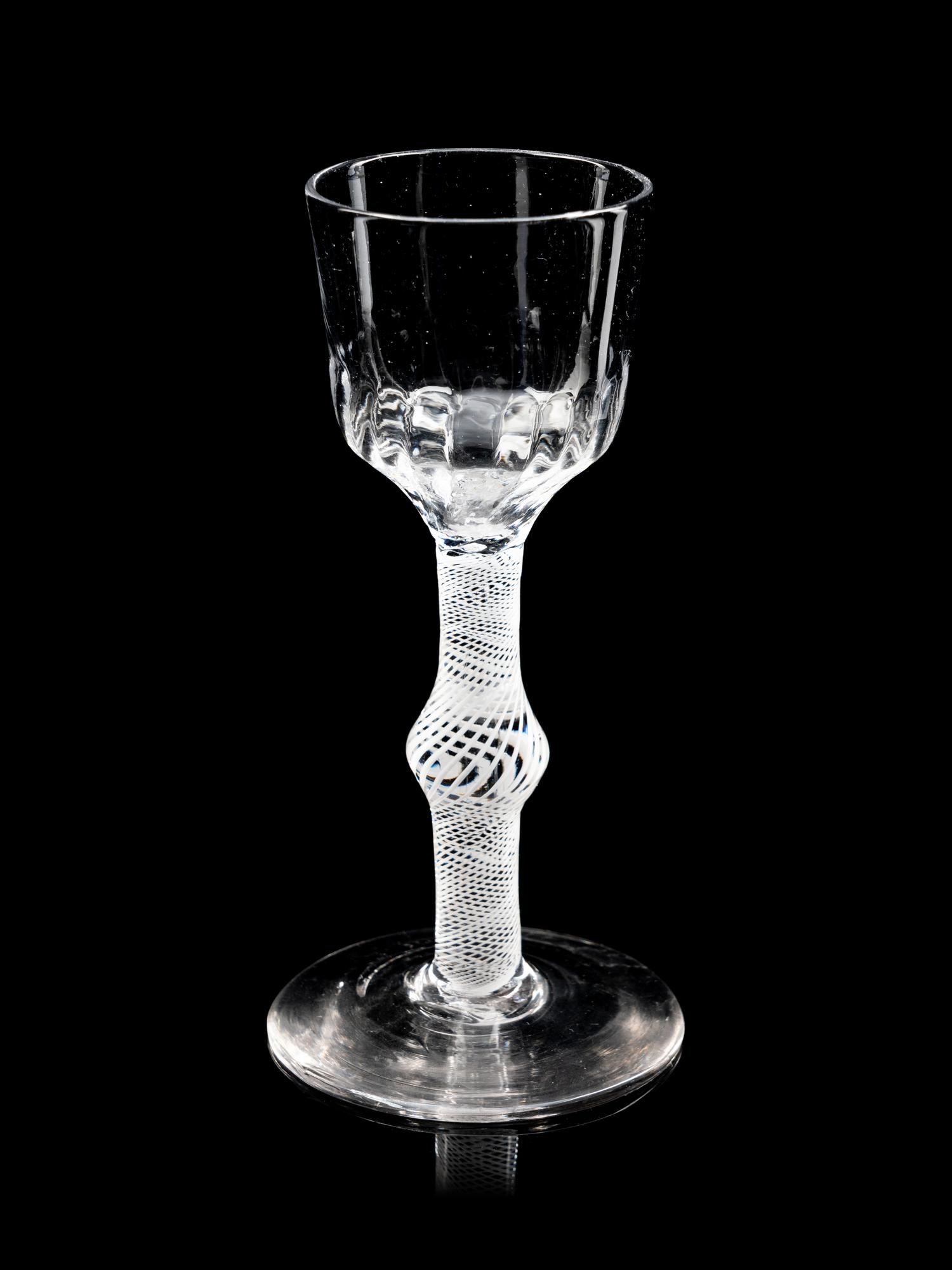 Two Moulded Glass Wine Glasses