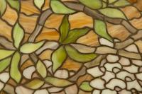 A Unique Art Glass Leaded Glass and Patinated Metal Wisteria Table Lamp