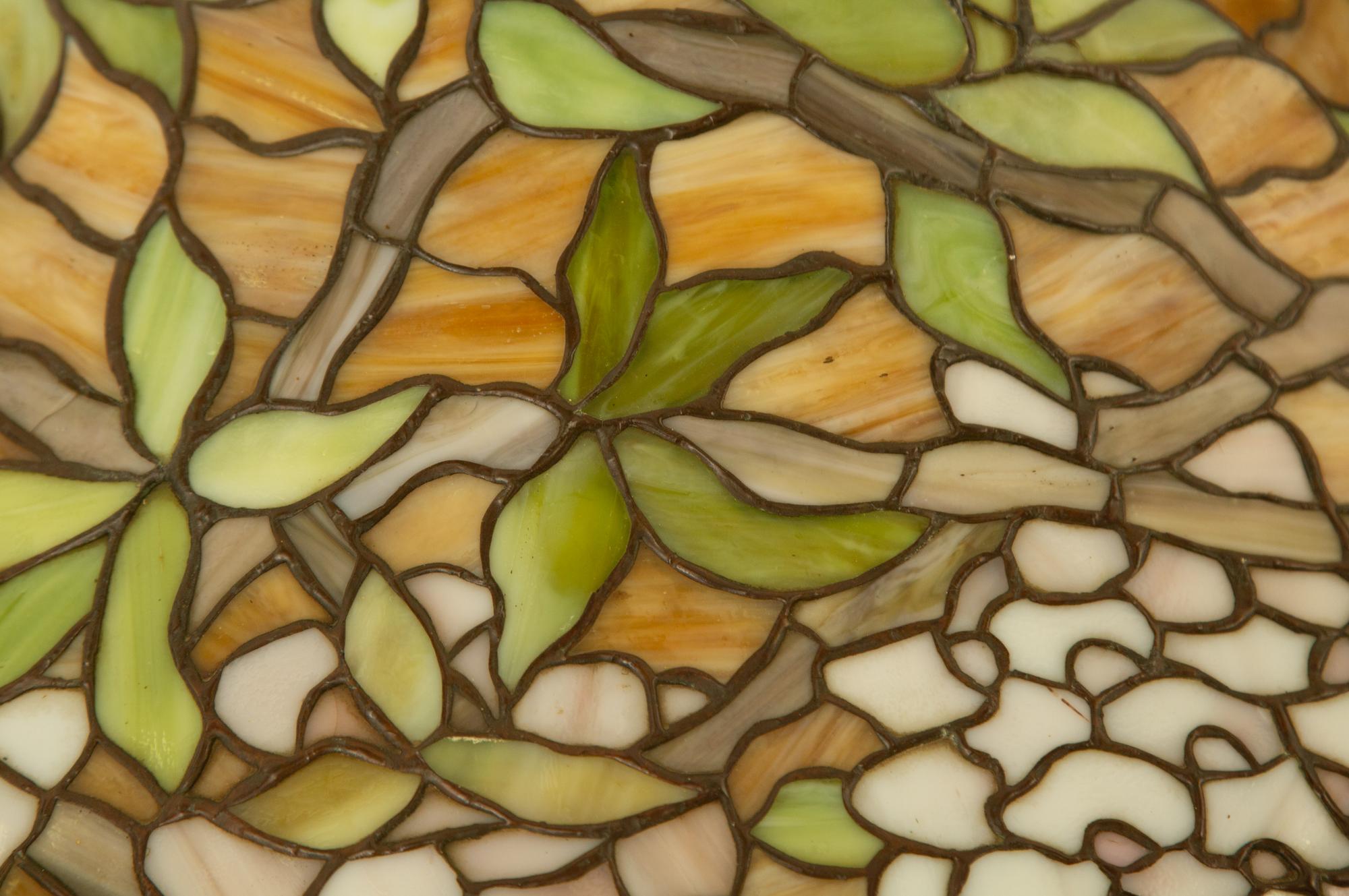 A Unique Art Glass Leaded Glass and Patinated Metal Wisteria Table Lamp