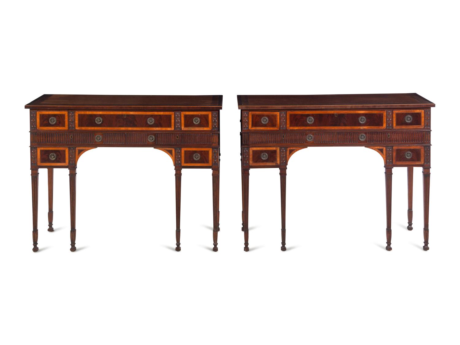 A Pair of George III Style Carved Mahogany and Satinwood Dressing Tables