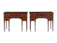 A Pair of George III Style Carved Mahogany and Satinwood Dressing Tables