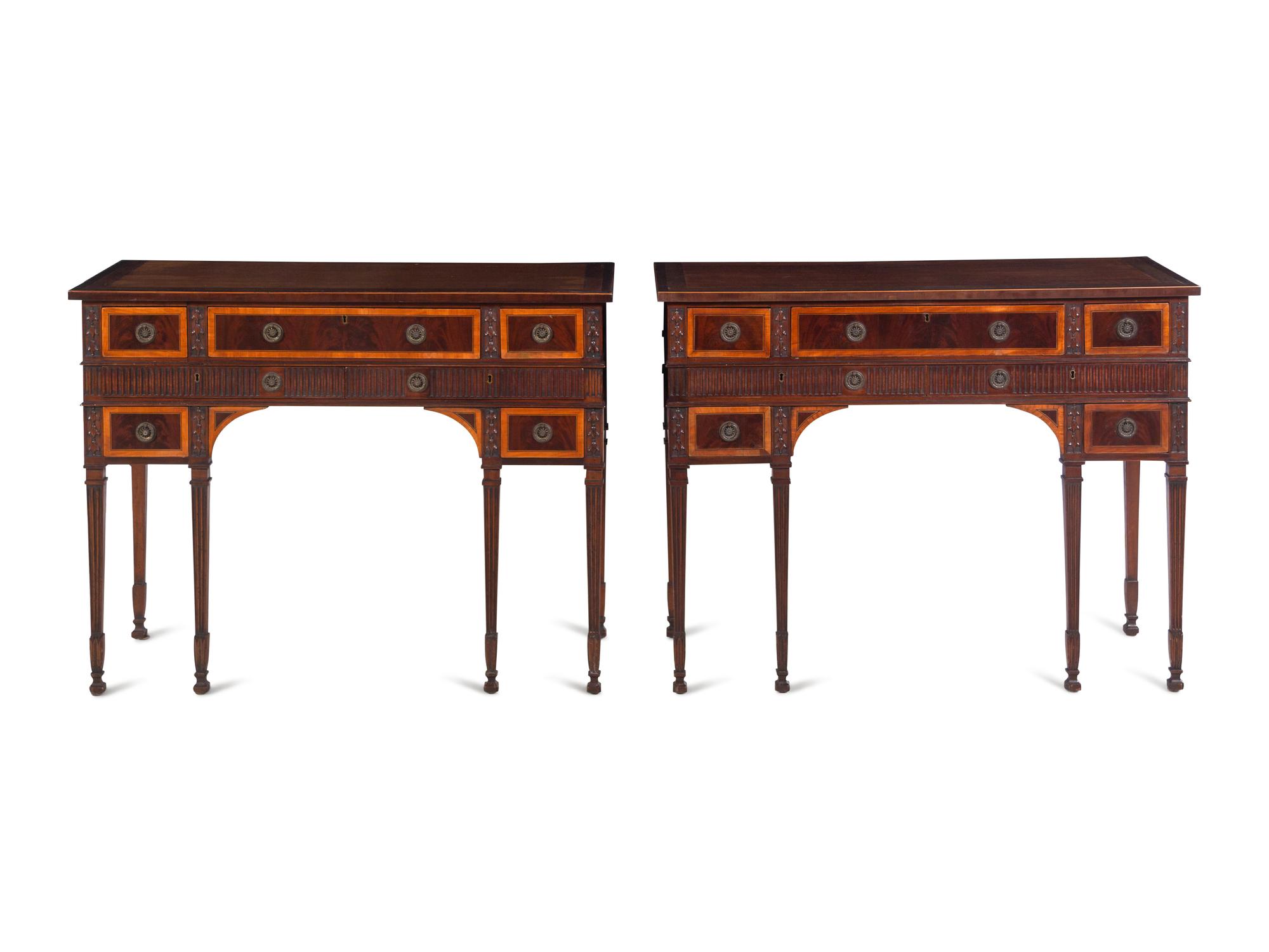 A Pair of George III Style Carved Mahogany and Satinwood Dressing Tables