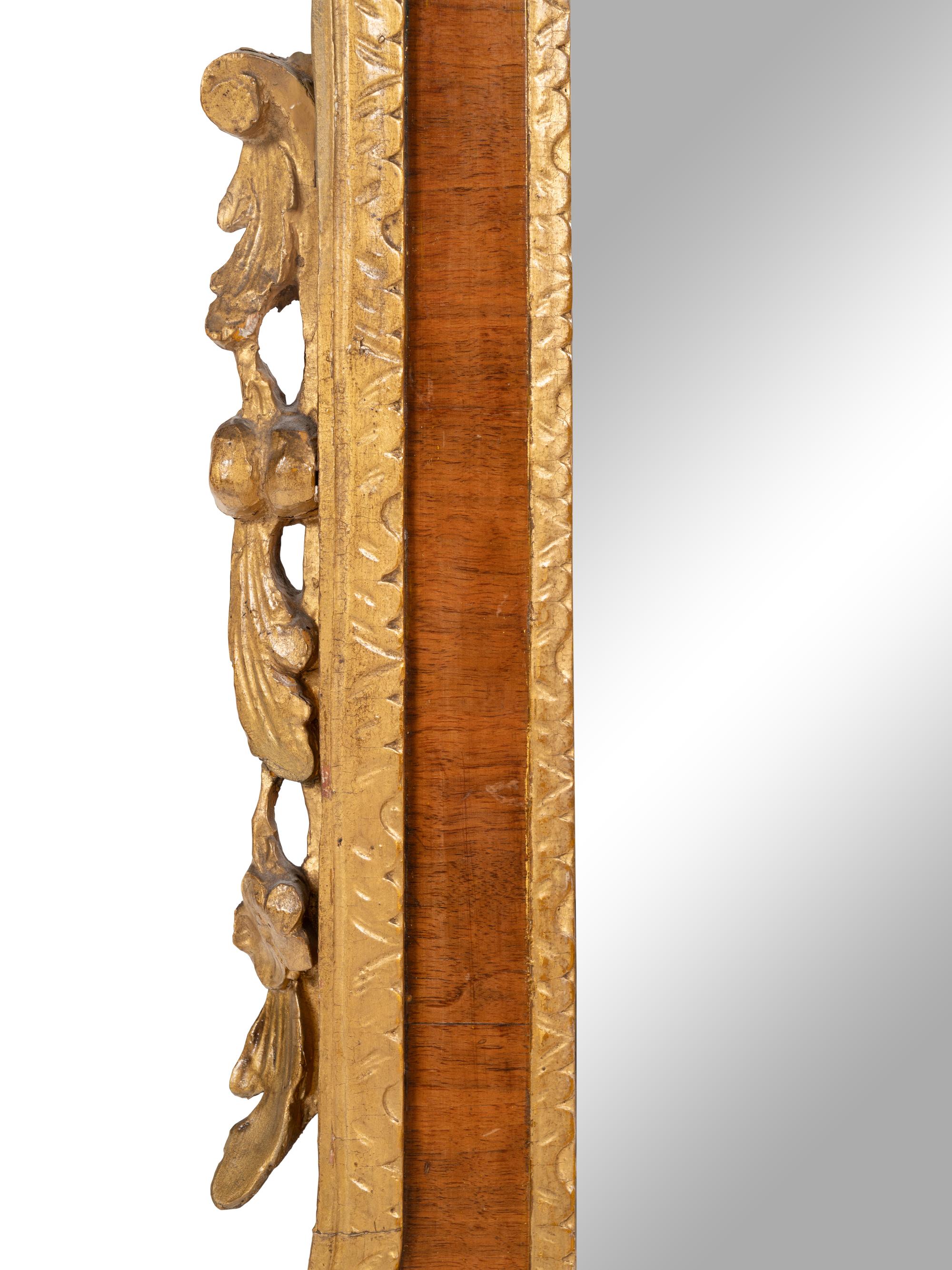 A George II Parcel Gilt Walnut Mirror