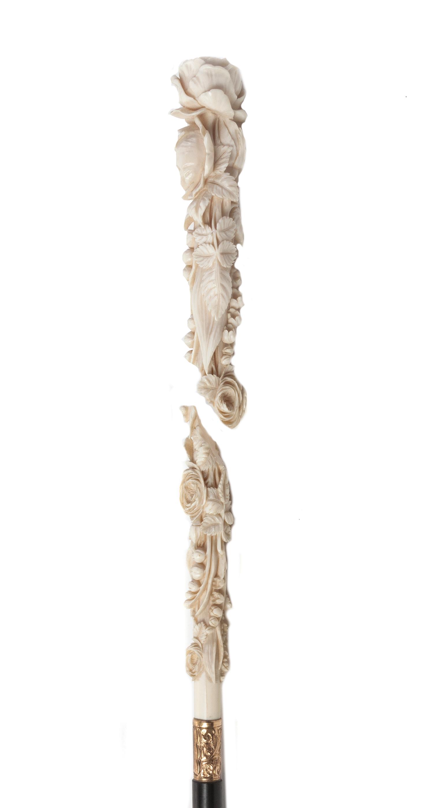 A Continental Ivory Handled Lady's Walking Stick, Length of handle 10 1/4 x length overall 44 3/4 inches.