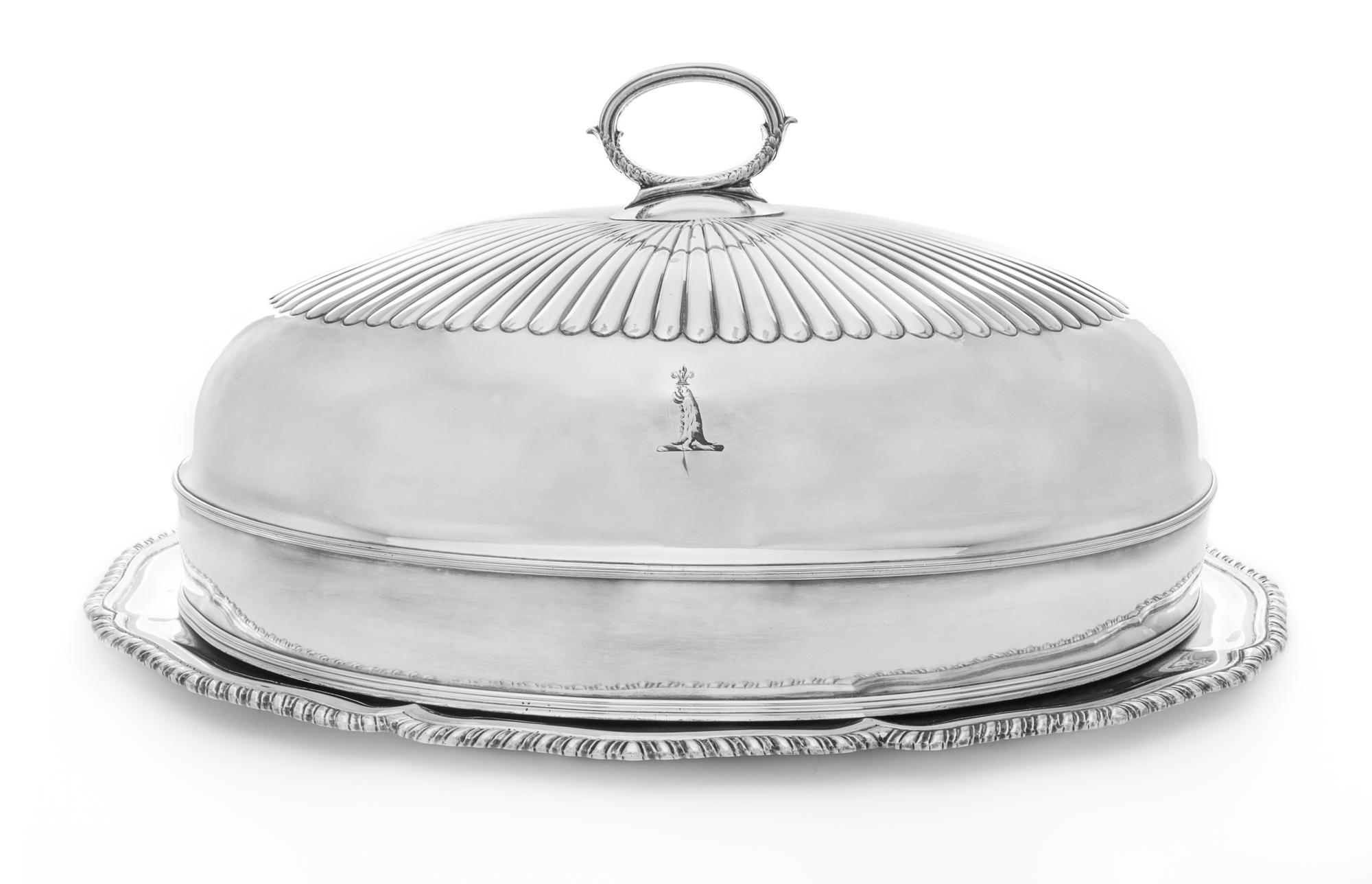 A Mexican Silver Dish, , having an undulating gadrooned rim, together with a silver-plate cloche with an engraved coat of arms.