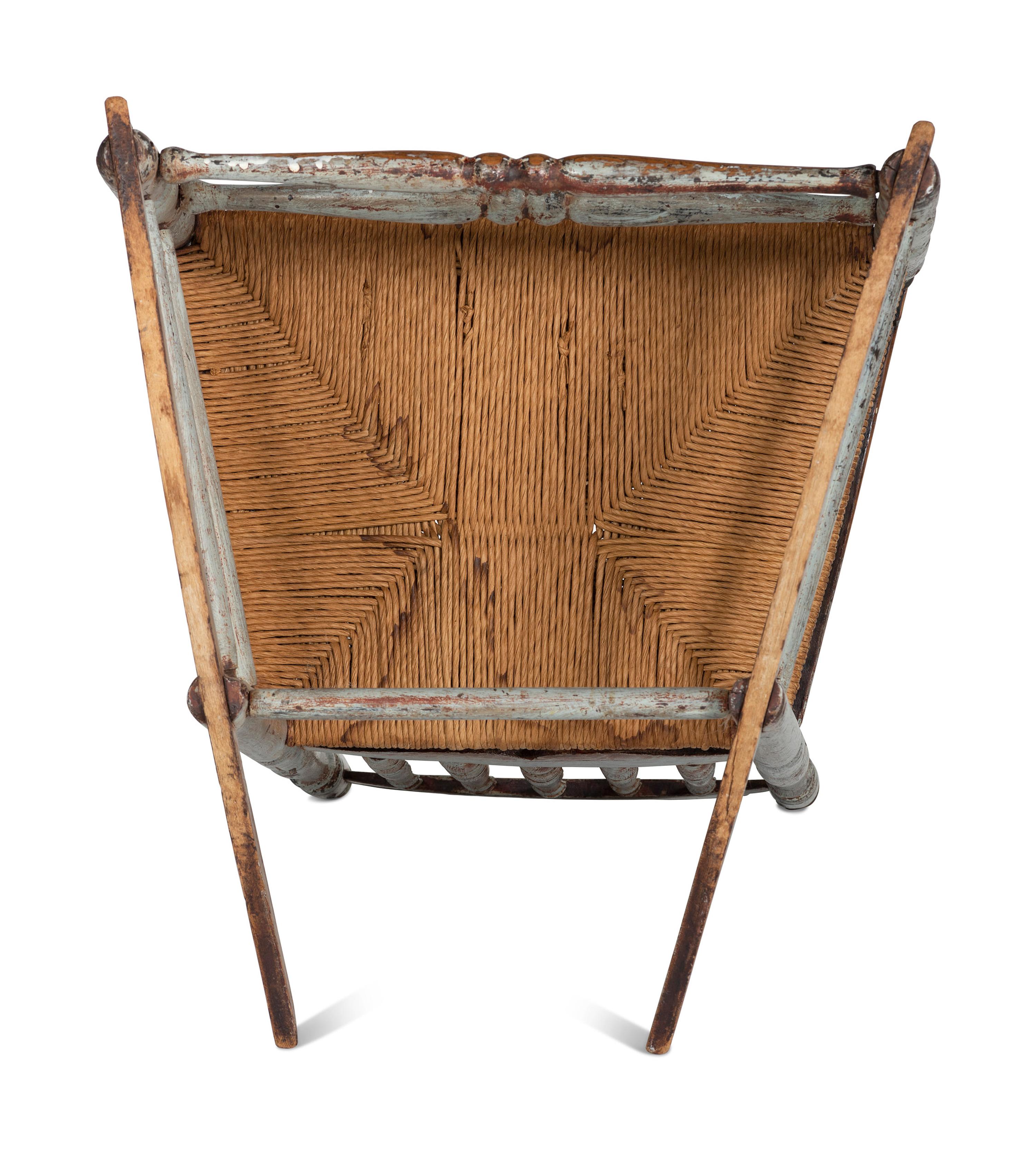 A William and Mary Paint Decorated Rush-Seat Bannister-Back Armchair Rocker
