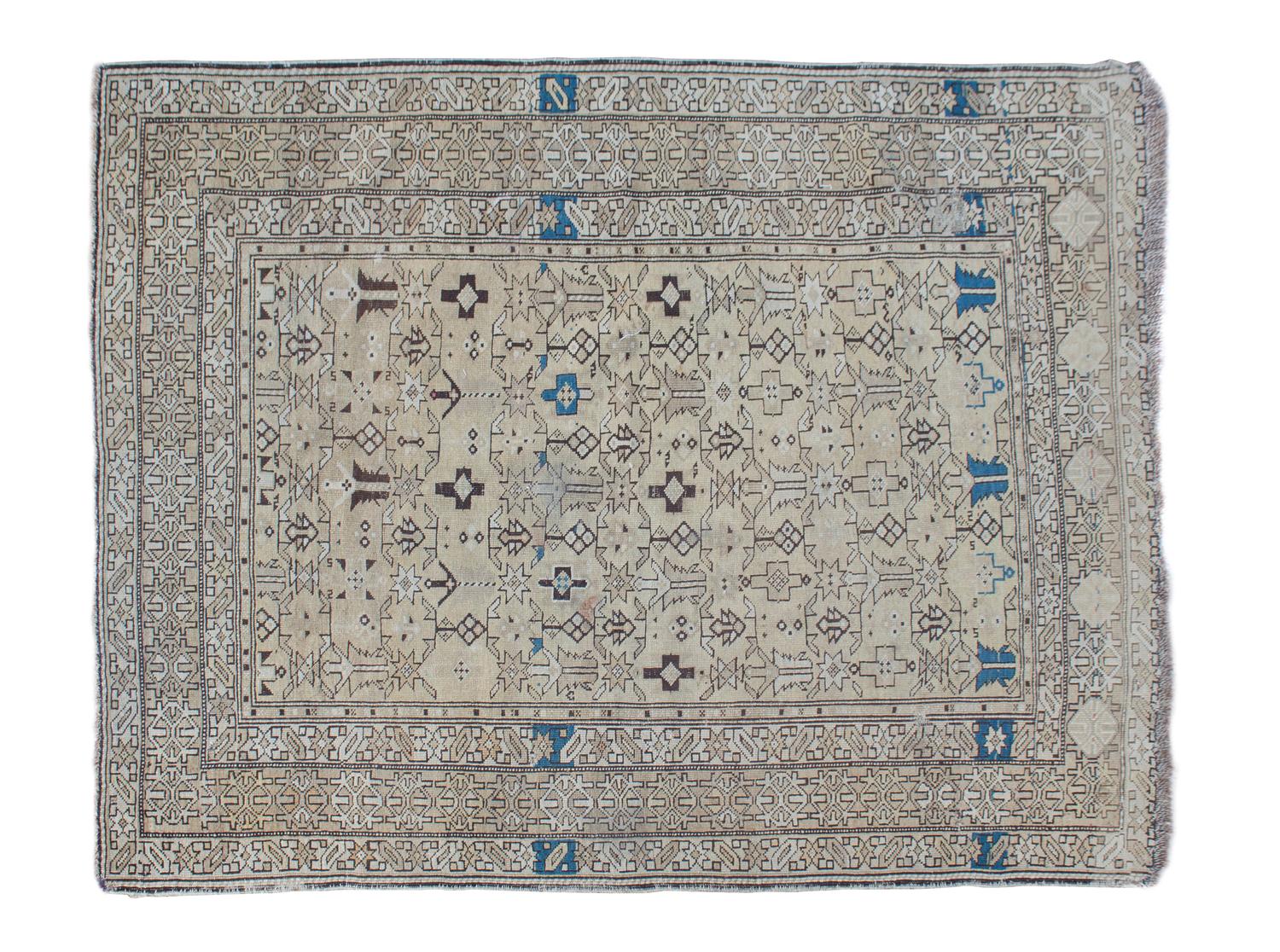 A Turkish Wool Rug 5 feet 3 inches x 4 feet 2 inches.
