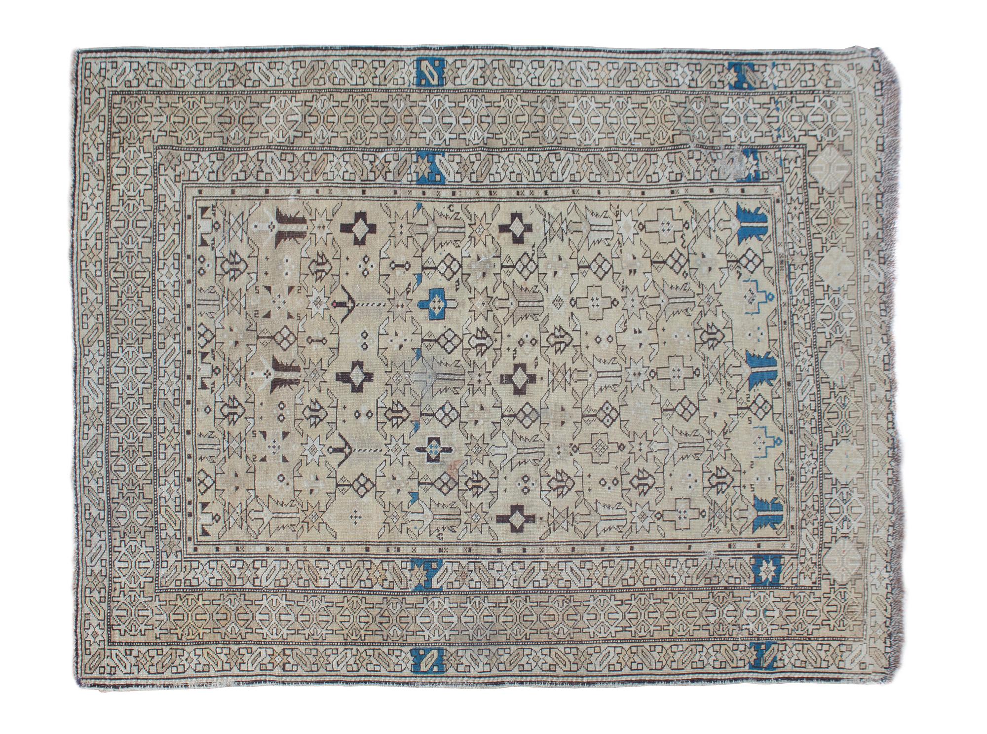 A Turkish Wool Rug 5 feet 3 inches x 4 feet 2 inches.