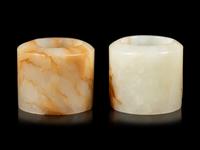 Two Russet and White Jade Archer's Rings