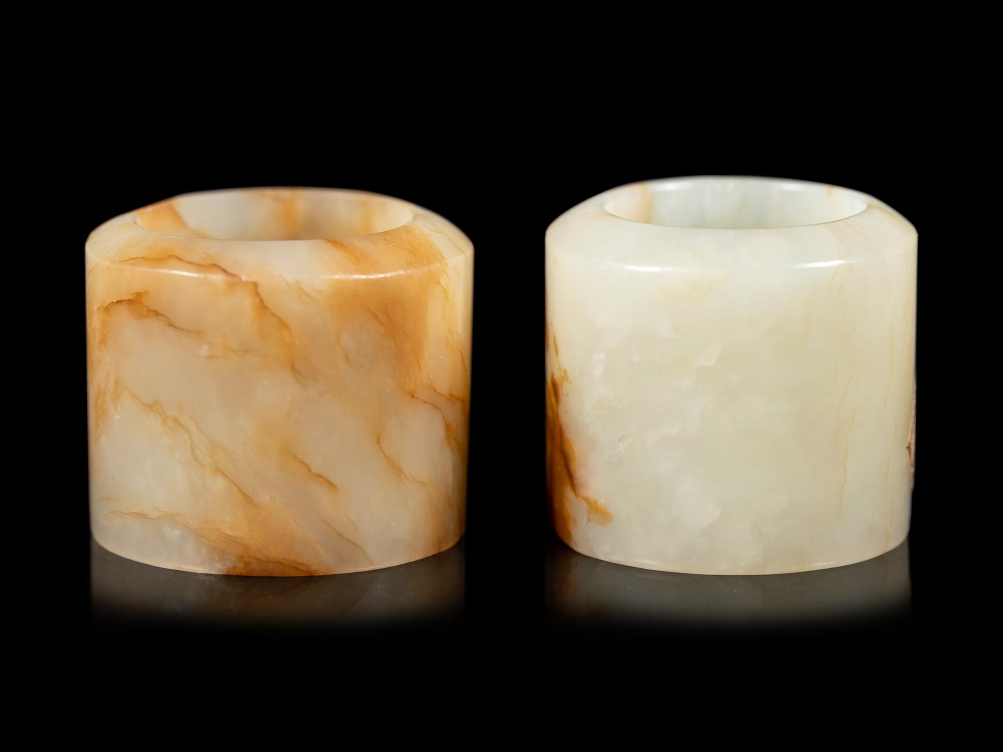 Two Russet and White Jade Archer's Rings