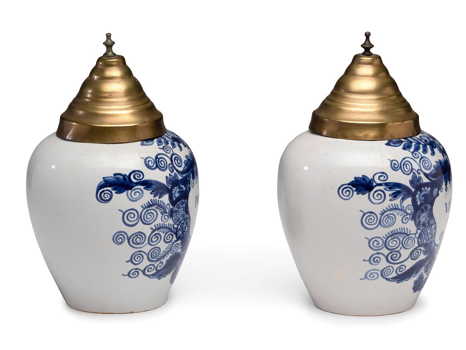 A Pair of Delft Lidded Tobacco Jars