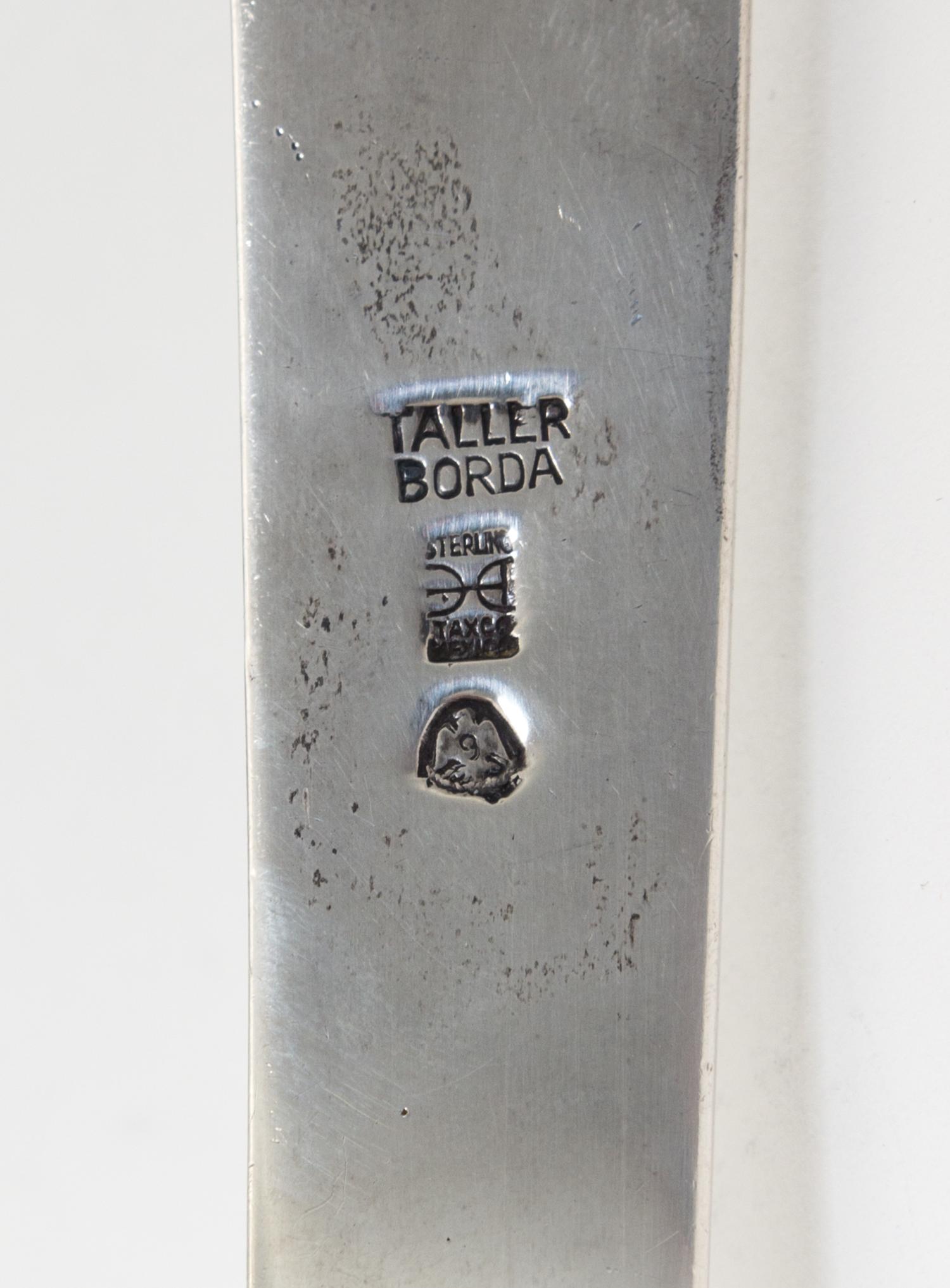 A Mexican Silver Server, Taller Borda, 20th Century, having triangular blade and scrolled handle