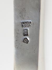 A Mexican Silver Server, Taller Borda, 20th Century, having triangular blade and scrolled handle