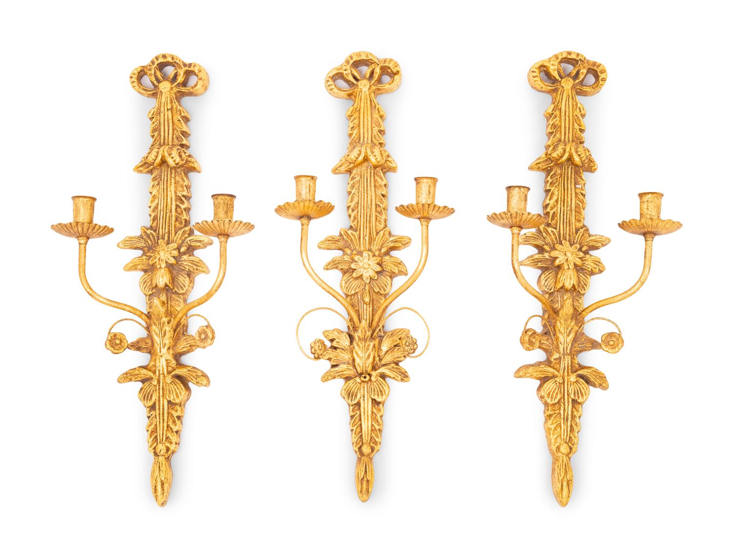 A Set of Three Italian Giltwood and Gilt Metal Two-Light Sconces