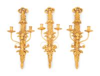 A Set of Three Italian Giltwood and Gilt Metal Two-Light Sconces