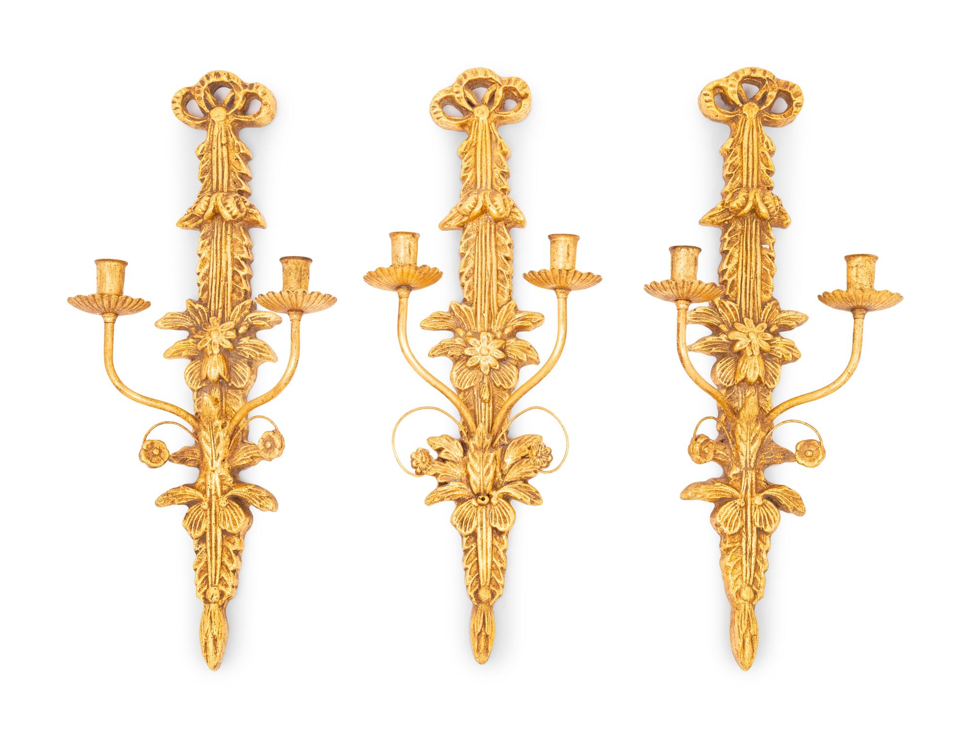 A Set of Three Italian Giltwood and Gilt Metal Two-Light Sconces