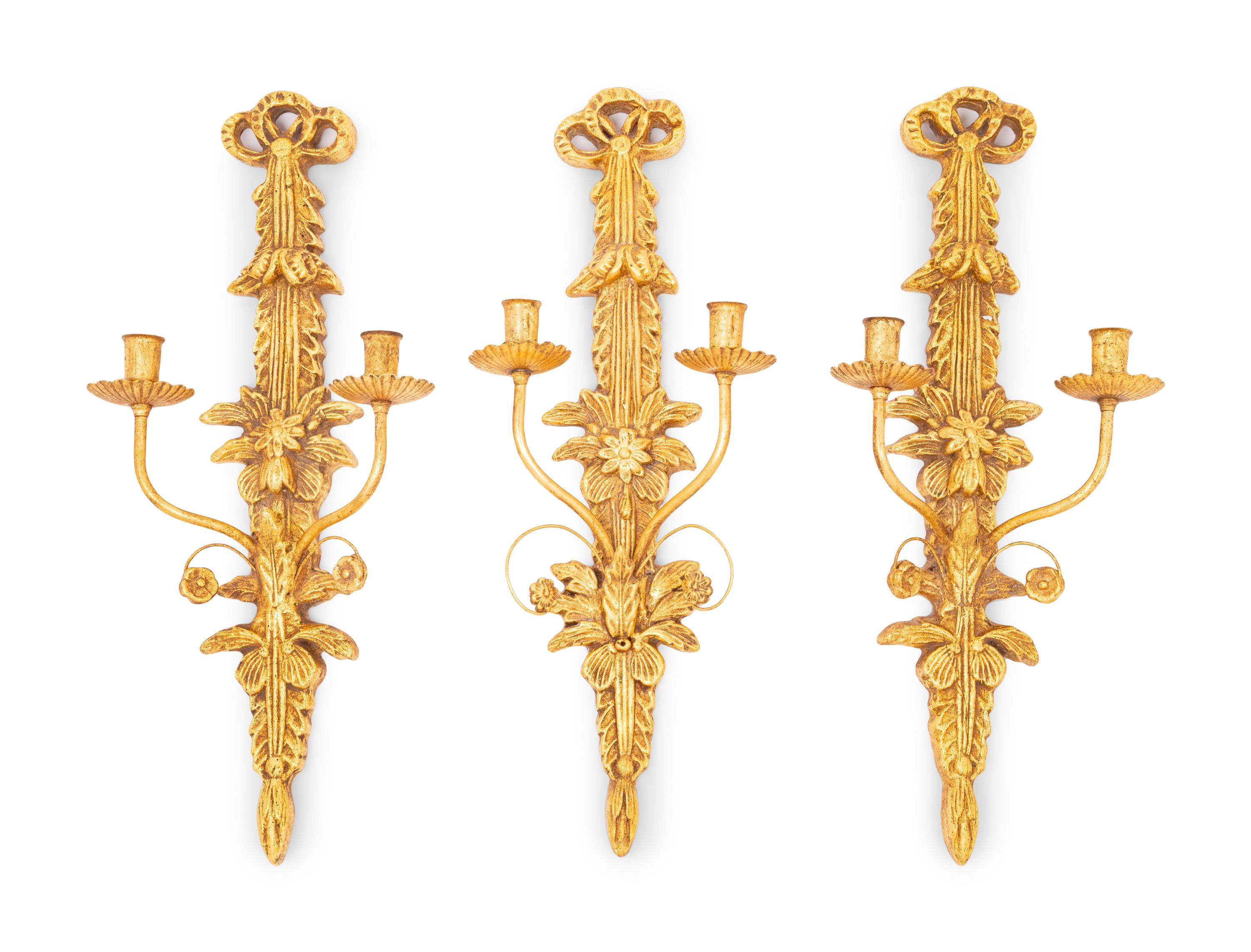 A Set of Three Italian Giltwood and Gilt Metal Two-Light Sconces