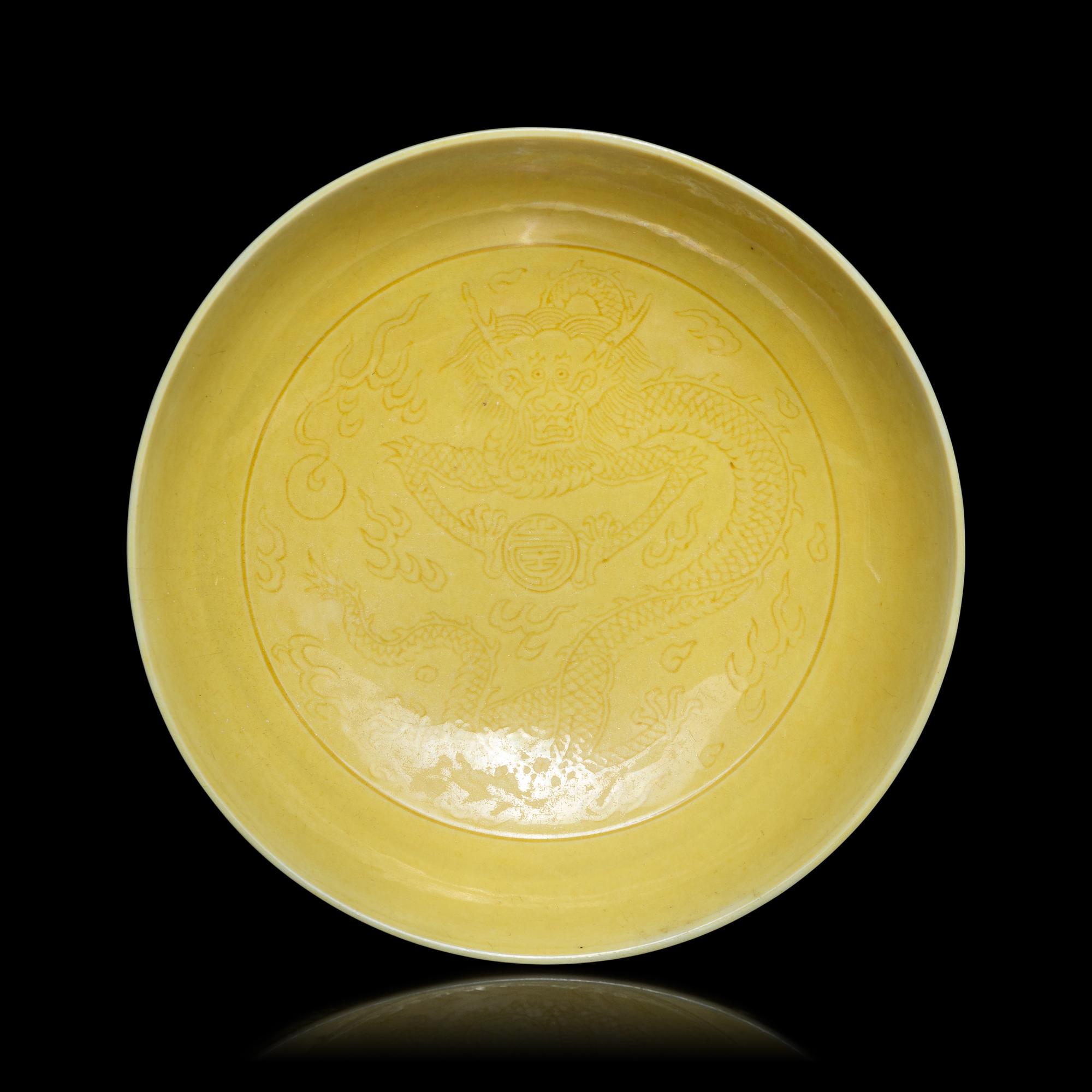 A Pair of Chinese Yellow Glazed Incised Porcelain 'Dragon' Dishes, Qianlong Marks and of the Period 清乾隆 嬌黃釉龍紋碟一對