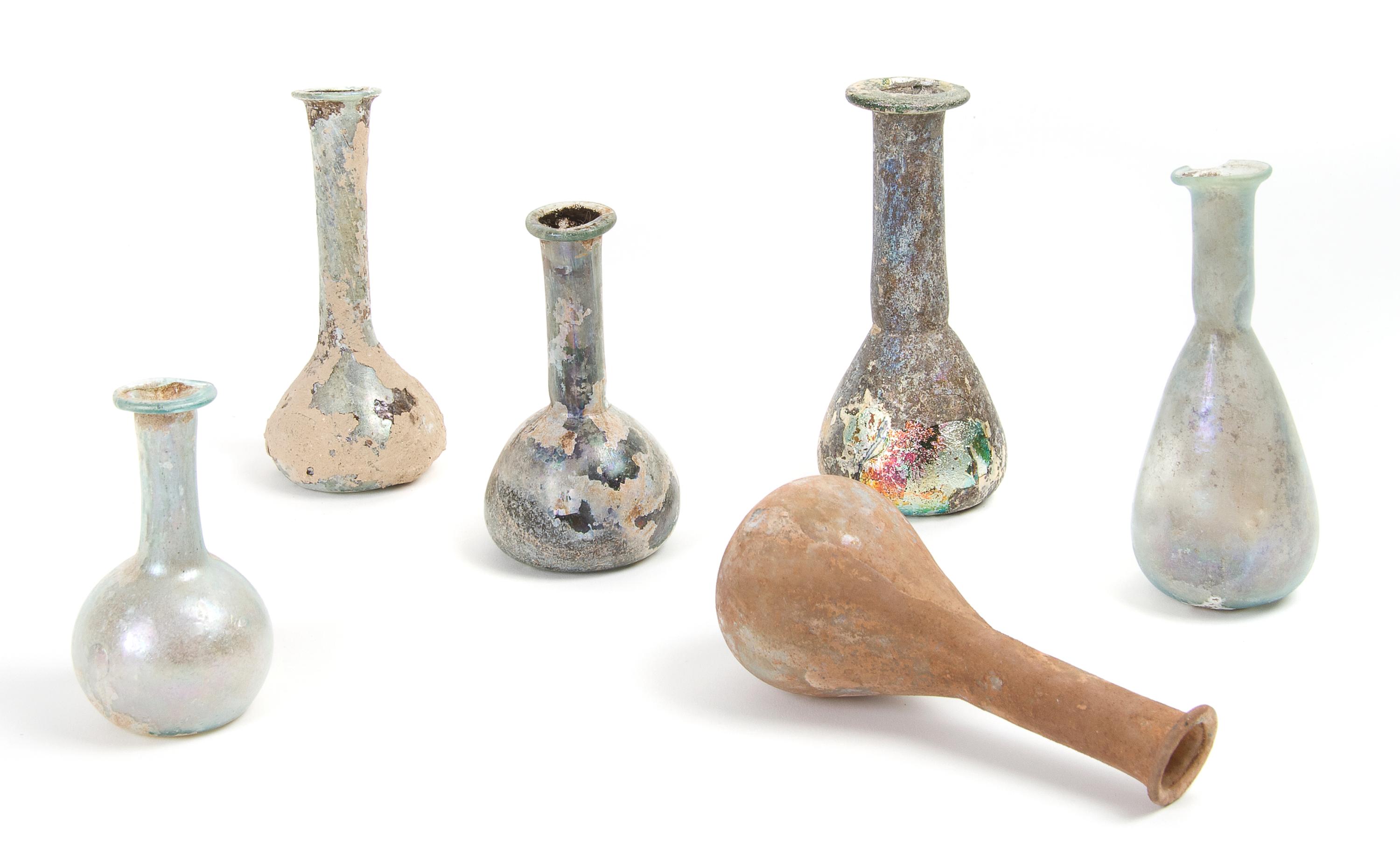 A Collection of Six Roman Glass Flasks, Height of tallest 4 7/8 inches.