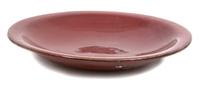 A Red Glazed Ceramic Charger Diameter 20 inches. — 20TH CENTURY