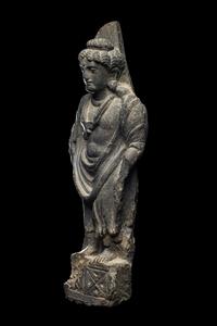 A Gandharan Grey Schist Figure of Maitreya