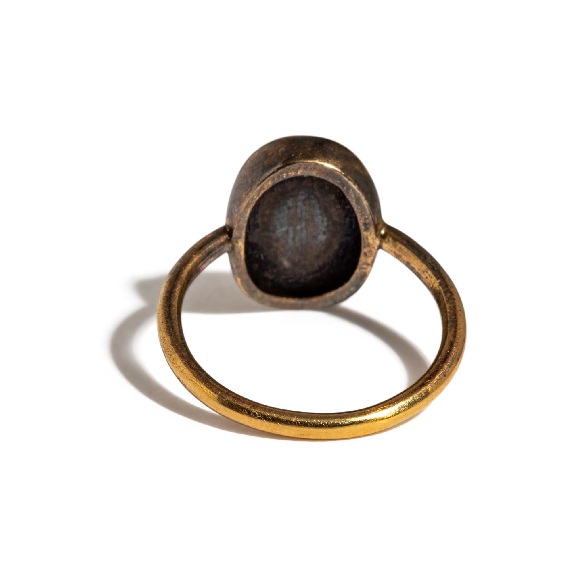A Neoclassical Gold and Garnet Finger Ring with the God Mars
