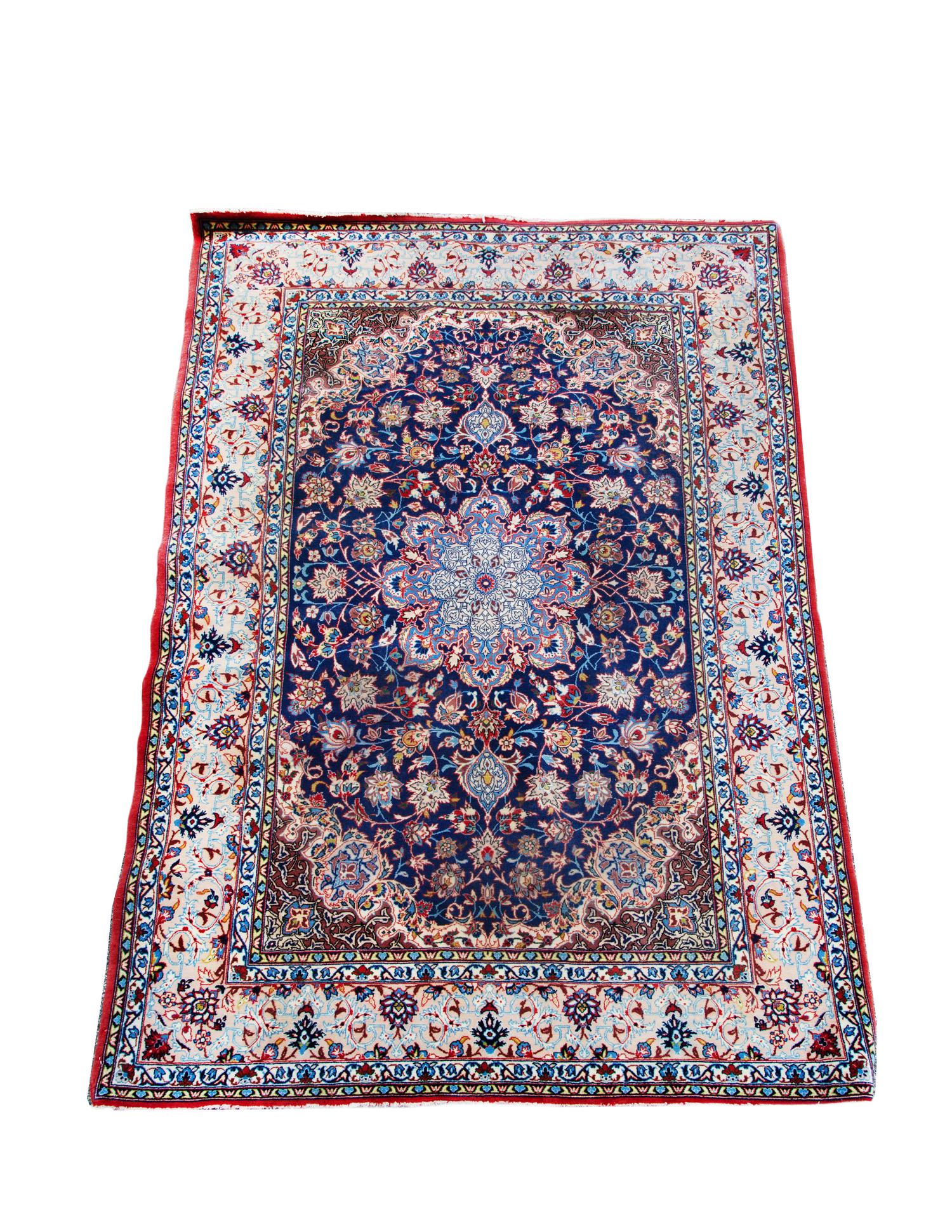 A Tabriz Wool and Silk Rug — 20TH CENTURY