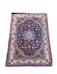 A Tabriz Wool and Silk Rug — 20TH CENTURY