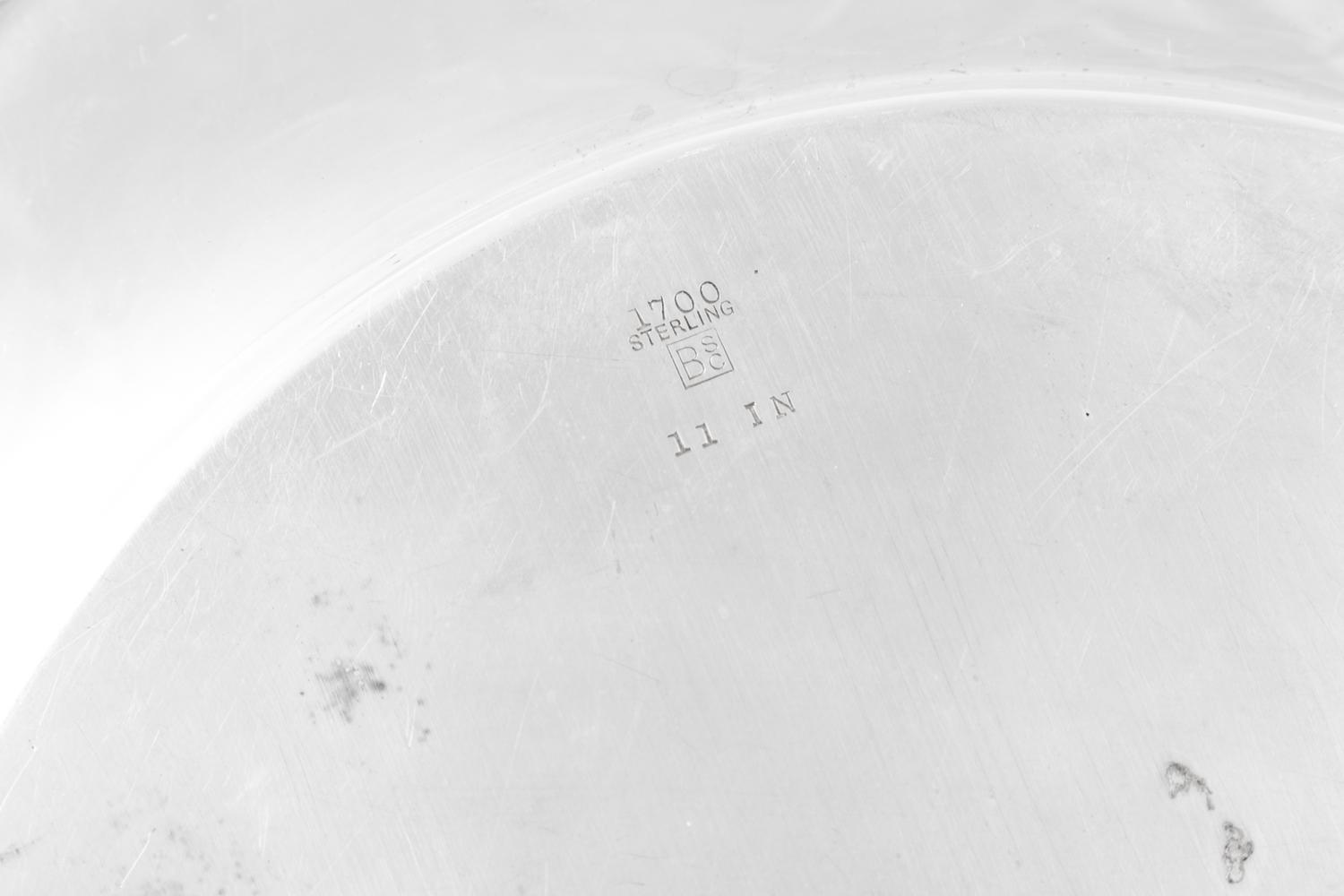 A Set of Eight American Silver Chargers