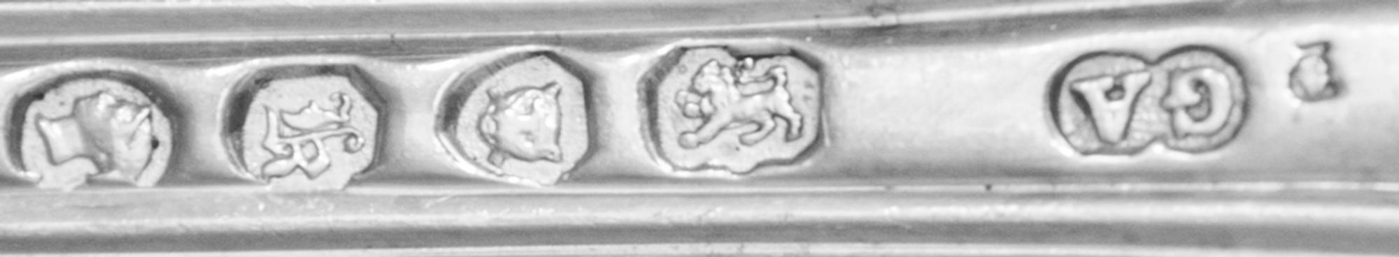 A Victorian Silver Serving Spoon, George William Adams, London, 1845, having a rocaille, acanthus and C-scroll decorated handle engrave